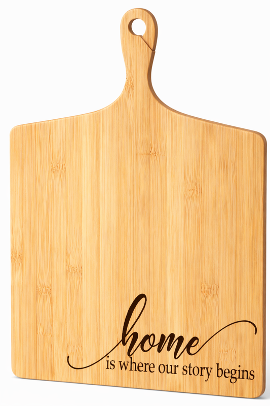 Home Is Where Our Story Begins” Engraved Bamboo Cutting Board – 17″ × 13